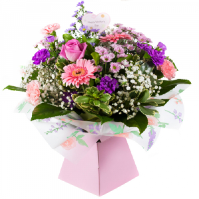 Pear Drops - A splash of sweet seasonal blooms arranged with style and beauty. This stunning hand tied arrangement will delight anyone lucky enough to receive it.
