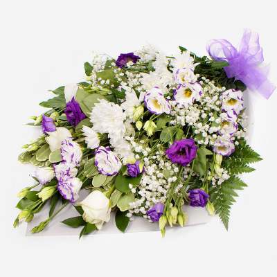 Funeral Flowers SYM-335 - Funeral Flowers in Cellophane Purple & White. *Fine Print: Every product is hand made and delivered by the local florist. Pictures shown are recent examples of an actual arrangement that was designed by talented florists! Please note that each individual florist cannot guarantee what the flower varieties or colours will be (unless specified on the product description), they will guarantee that your specific arrangement will be fresh and beautiful.