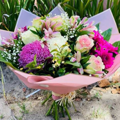 Sea Breeze - A lovely handtied bouquet created using pale pink roses, purple and white flowers with complimentary foliage. Hand delivered with care in and around Cape Town by Shirleys Flower Designs.
